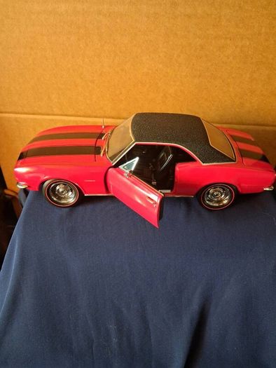 Model cars and bar signs