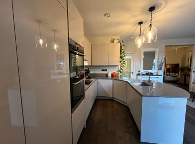 KUBE Modern High-Gloss Kitchen & AEG Appliances