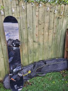 snowboard, bindings and bag
