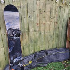 snowboard, bindings and bag