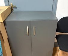 Desk with three drawer pedestal and cabinet
