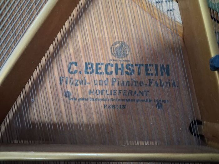 C. Bechstein baby grand piano