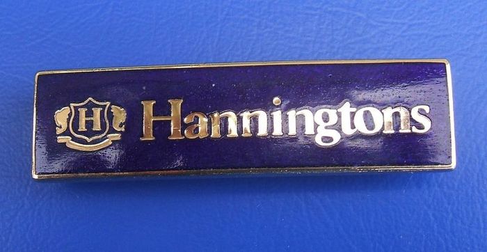 HANNINGTONS (Manhattan Windsor Ltd) - a retail assistant's badge of Hanningtons department stores, Brighton (1970's - 1990's)