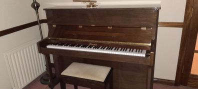 Piano As New