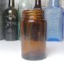 81 - Vintage Kruschen Salts Dark Brown Glass Bottom Embossed Bottle Image 2