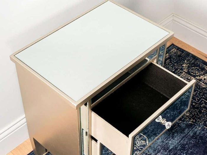 2 srawer mirrored bedside locker is for sale