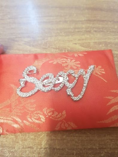 "Sexy" brooch