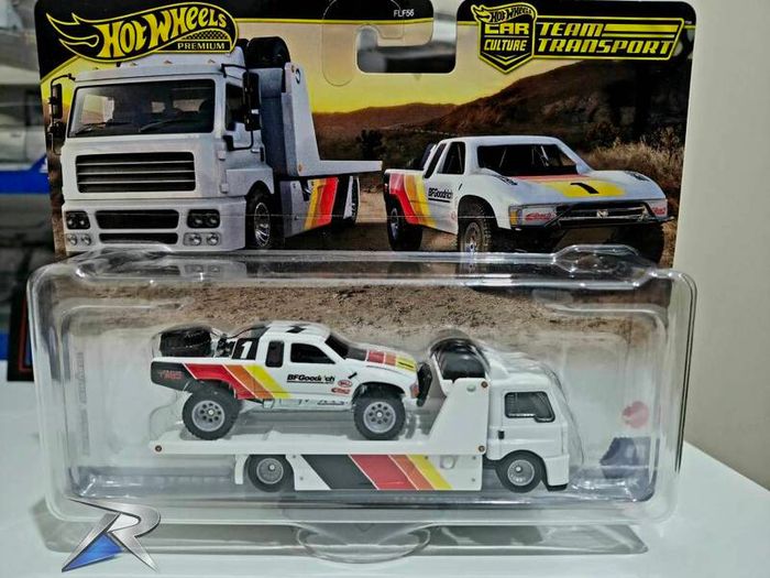Hotwheels Toyota Off Road Truck with Fleet Street transporter.