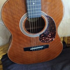 Hondo acoustic guitar.