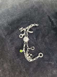 Thomas Sabo Charm Club wristwatch in sterling silver featuring a unique bracelet with 6 charms included