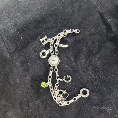 Thomas Sabo Charm Club wristwatch in sterling silver featuring a unique bracelet with 6 charms included