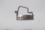 a antique decanter label for brandy nickel silver