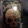 SWAP OR SELL black and gold skull i phone cover Image 2