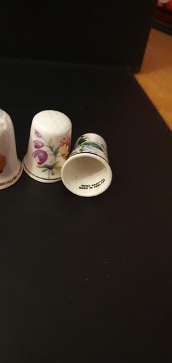 Collection of Flower Themed Gold Coloured Edged Thimbles