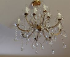 Chandelier 12 arm made with SWAROVSKI crystals color gold