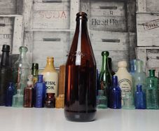 263 - Vintage Magners Embossed Letters Brown Glass Decorative Collectible Bottle