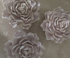 Three pieces of ceramic flowers