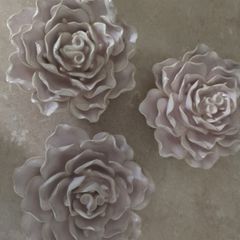 Three pieces of ceramic flowers