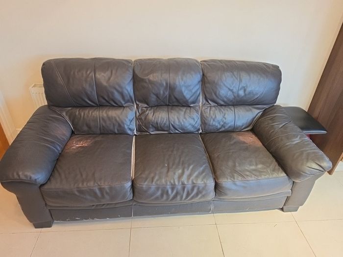 brown leather sofa - free damage but free to take for collection