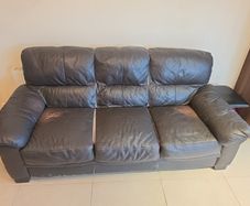 brown leather sofa - free damage but free to take for collection