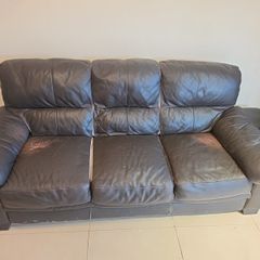 brown leather sofa - free damage but free to take for collection