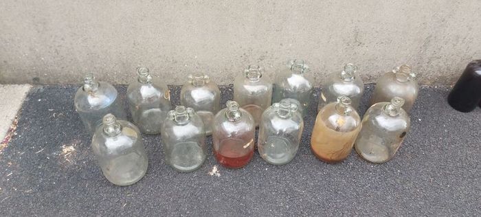 13 x demi johns,glass jars ,used condition, needs a clean,,buyer collects,,10 euros each or a deal  for the 13 ,sold as is