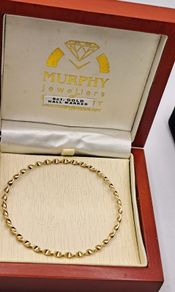9 ct yellow gold  round twist bangle