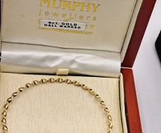 9 ct yellow gold  round twist bangle