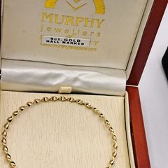 9 ct yellow gold  round twist bangle