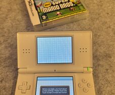 Nintendo DS Lite White + New Super Mario Bros + Case & Accessories
