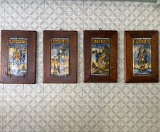 Four vintage hand-painted Castelli ceramic tiles depicting the four seasons (Spring, Summer, Autumn and Winter)