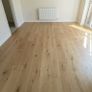 Laminated wood floor fitting Image 5