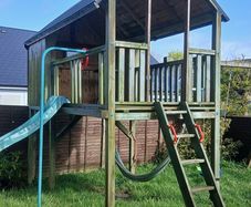 playhouse, slide and swings