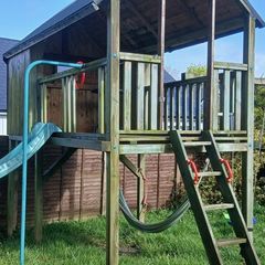 playhouse, slide and swings