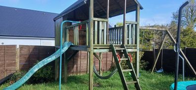 playhouse, slide and swings