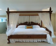 Four poster carved Indonesian bed super king incl bedside tables and dresser