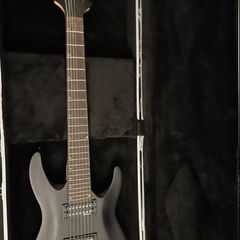 Jackson 7 string Dinky electric guitar