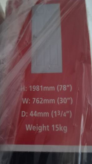2 six panel interior doors - still in packaging