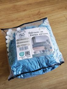 Set of two velour sofa covers in an original packaging