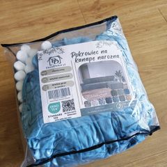 Set of two velour sofa covers in an original packaging