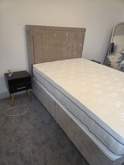 Double bed new (mattress included & headboard)