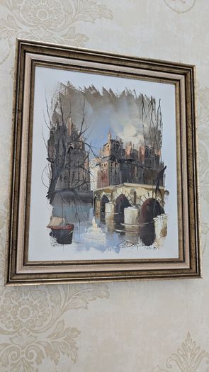 Pair of framed Parisian city scene prints