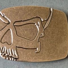 Belt buckle, skull design.