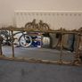 Two distinct antique giltwood mirrors with elaborate French-style ornamentation Image 6