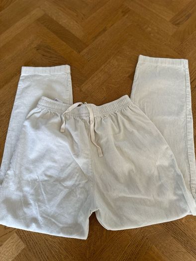 Uniglo cream corduroy trousers