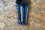 Plasterboard anchor setting tool
