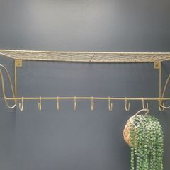 Danish interior design brass shelf with hooks