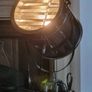 The Nautical is a large floor lamp with a tripod Image 3