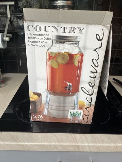 Drinks dispenser and bottle cooler