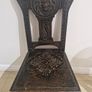 Carved oak antique chair with lion face motif Image 4